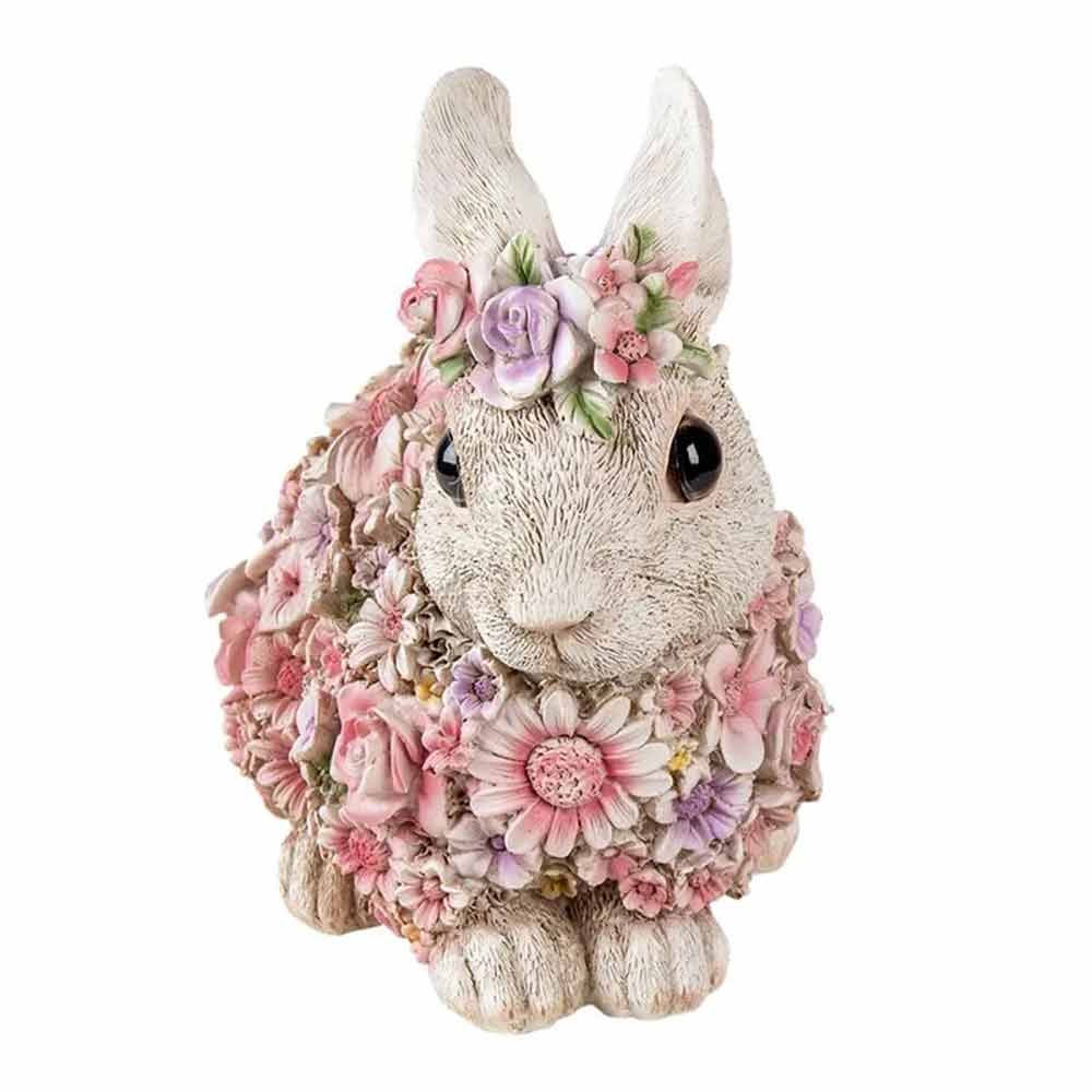 Dekoratives Clayre & Eef - Hase Blumen geschmückt mit einem Blumenkranz.