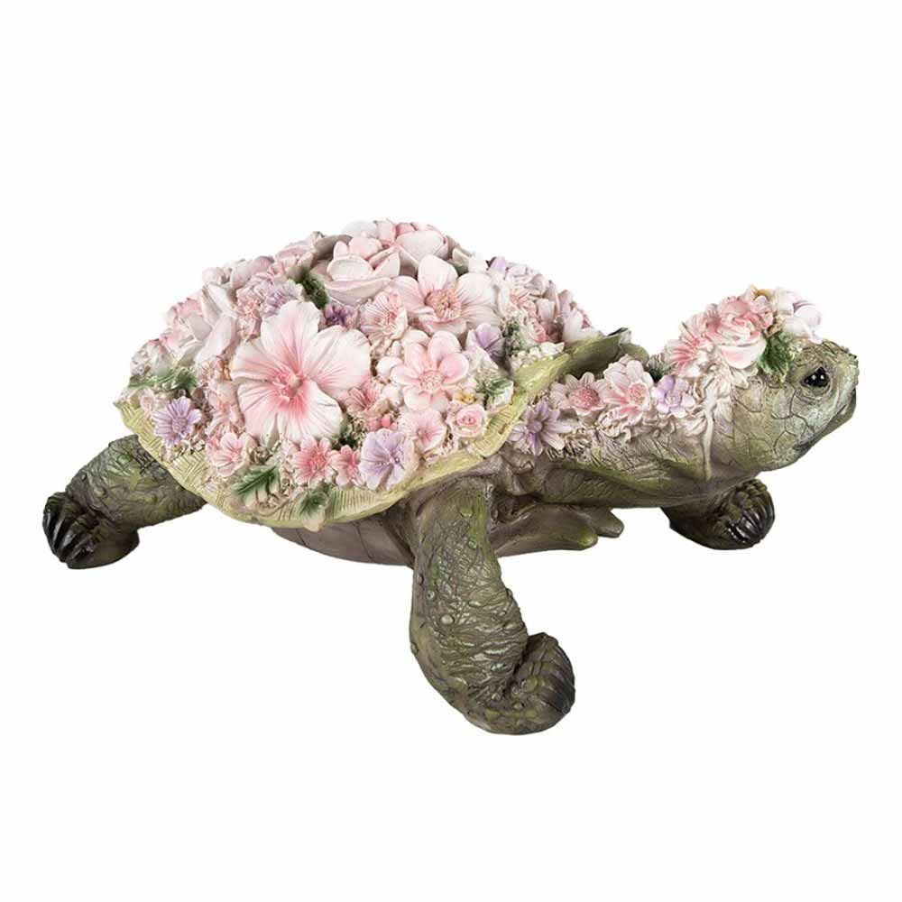 Eine Clayre & Eef - Schildkröte Deko mit rosa Blumen auf der Rückseite.