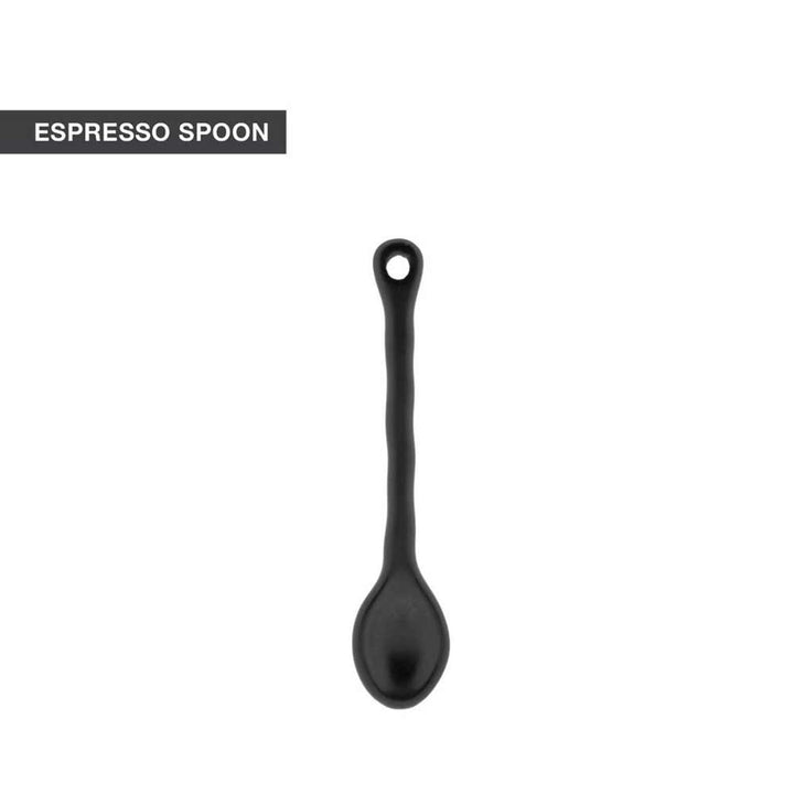 Schwarzer „Bastion Collections – Löffel für Espresso wellenförmig“ mit Loch am Griffende, abgebildet auf weißem Untergrund. Oben links ist die Beschriftung „ESPRESSO SPOON“ zu sehen.