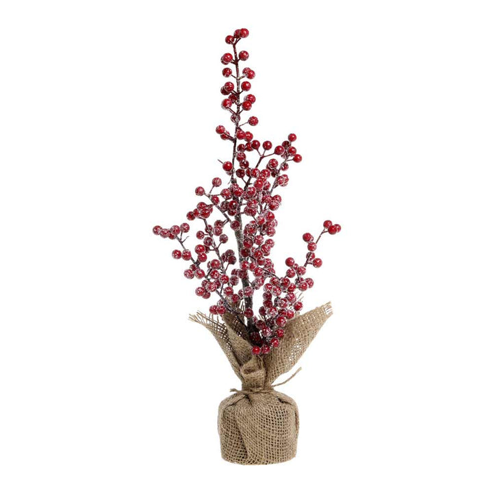 Ein Chic-Antique - Fleur Baum-Zweig mit roten Beeren steht in Sackleinen eingewickelt, mit einer Höhe von 40 cm.