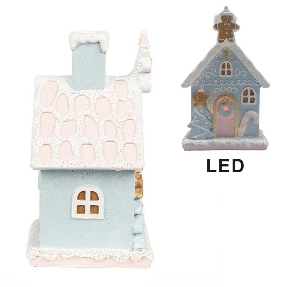 Zu sehen sind zwei pastellfarbene Miniatur-Weihnachtshäuser aus Keramik. Das rechte mit der Bezeichnung „Clayre & Eef – Lebkuchenhaus mit LED Blau 15 cm“ trägt eine „LED“-Aufschrift, die anzeigt, dass es leuchtet. Beide Häuser haben schneebedeckte Dächer und Fenster.