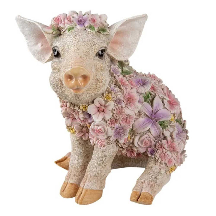 Eine detailreiche Figur eines mit pastellfarbenen Blumen geschmückten Schweins, das auf allen Vieren sitzt, das Clayre & Eef - Schwein Blumen Deko.