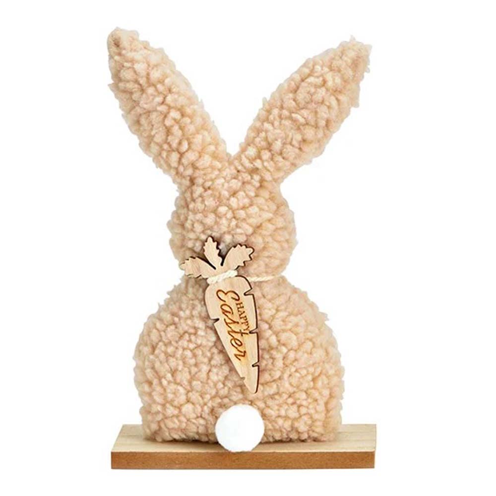Eine G. Wurm - Aufsteller Hase Teddyfigur mit flauschiger Textur und einem Anhänger mit der Aufschrift „Ostern“.