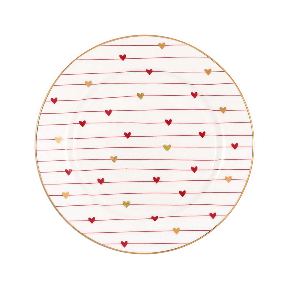 Ein runder weißer Teller ist mit roten und goldenen Herzen verziert, die in horizontalen Reihen angeordnet sind. 

GreenGate - Grace Keksteller