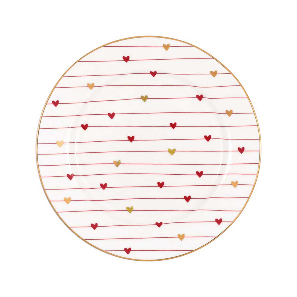Ein runder weißer Teller ist mit roten und goldenen Herzen verziert, die in horizontalen Reihen angeordnet sind. 

GreenGate - Grace Keksteller