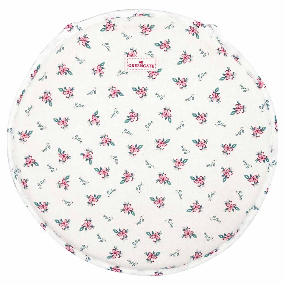 Rundes weißes Tuch mit einem Muster aus kleinen rosa und grünen Blumen und einem kleinen rechteckigen Etikett mit der Aufschrift „GreenGate – Jalia Sitzkissen rund weiß“.