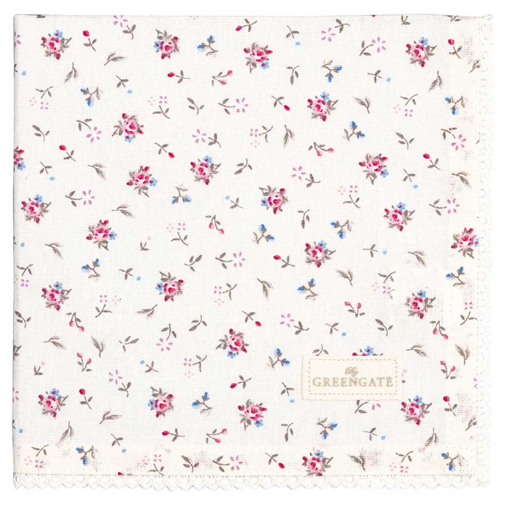 Eine weiße Stoffserviette mit kleinen blauen und rosa Blumenmustern und Spitzenbesatz am Rand, versehen mit einem „GreenGate - Junia Stoffserviette mit Spitze weiß“-Etikett.