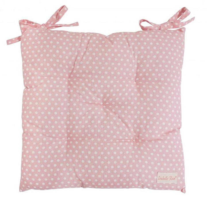 Ein rosa, gepunktetes Kissen mit gebundenen Ecken und getufteten Knopfdetails, Isabelle Rose – Sitzkissen mit Punkten.