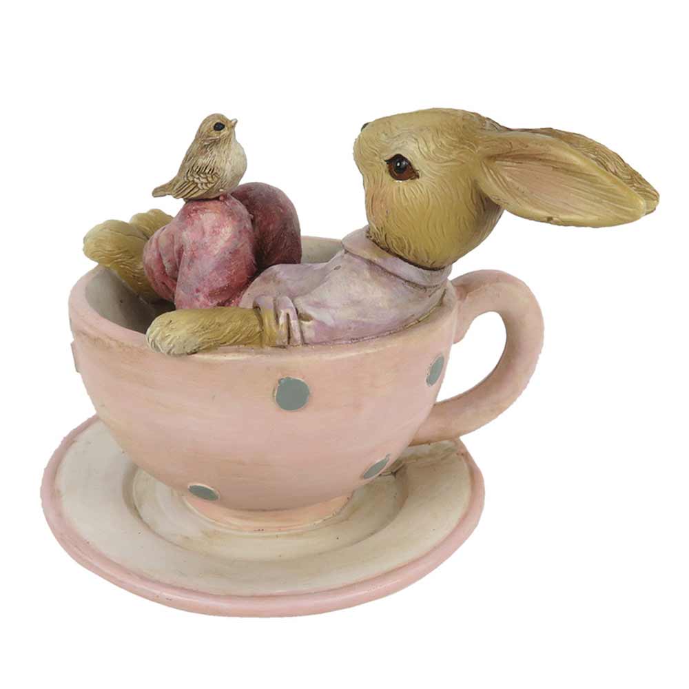 Ein Clayre & Eef – Hase in Tasse mit Vogel Rosa sitzt in einer rosa Tasse.