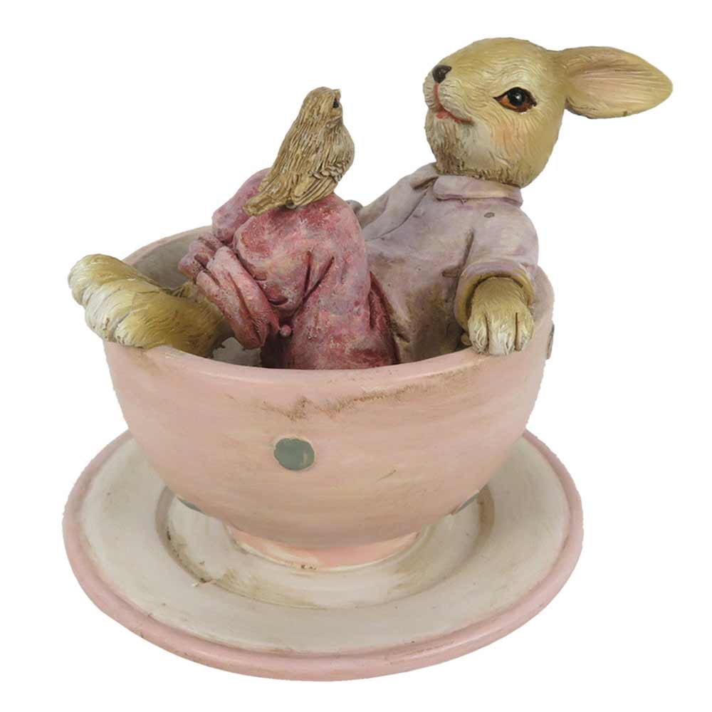 Ein Clayre & Eef – Hase in Tasse mit Vogel Rosa sitzt in einer rosa Tasse.