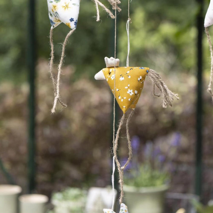 Ib Laursen - Huhn gelb mit Blumen weiß