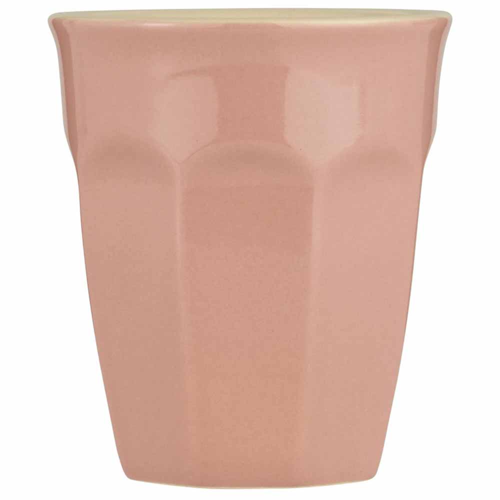 Ein schlichter rosa Ib Laursen - Cafe Latte Becher Mynte mit glatter Oberfläche und leicht konischem Design, von vorne betrachtet.